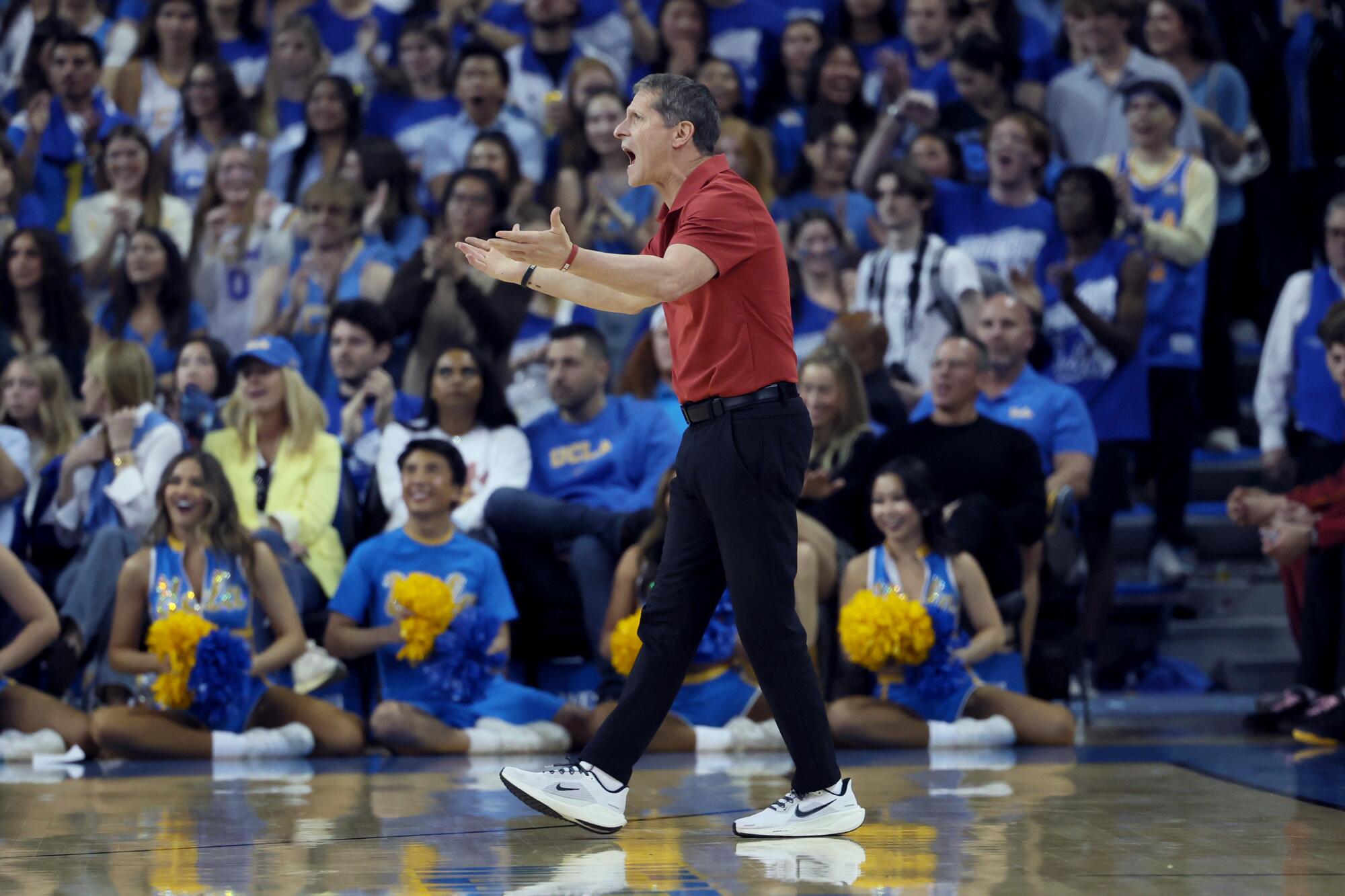 USC men's basketball coach Eric Musselman shouts during a loss to UCLA at Pauley Pavilion on Saturday.