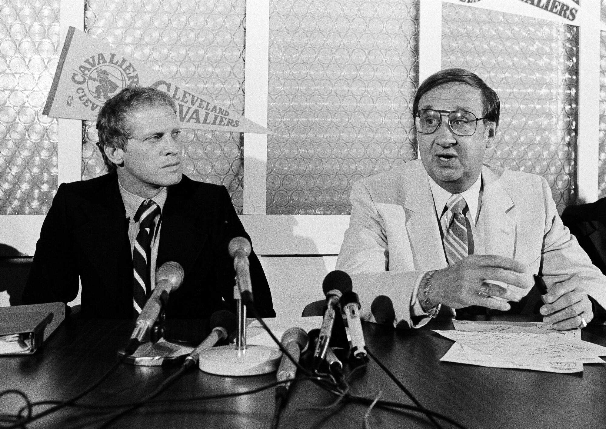 Cavaliers president Ted J. Stepien introduces new head coach Bill Musselman during a news conference on June 13, 1980. 