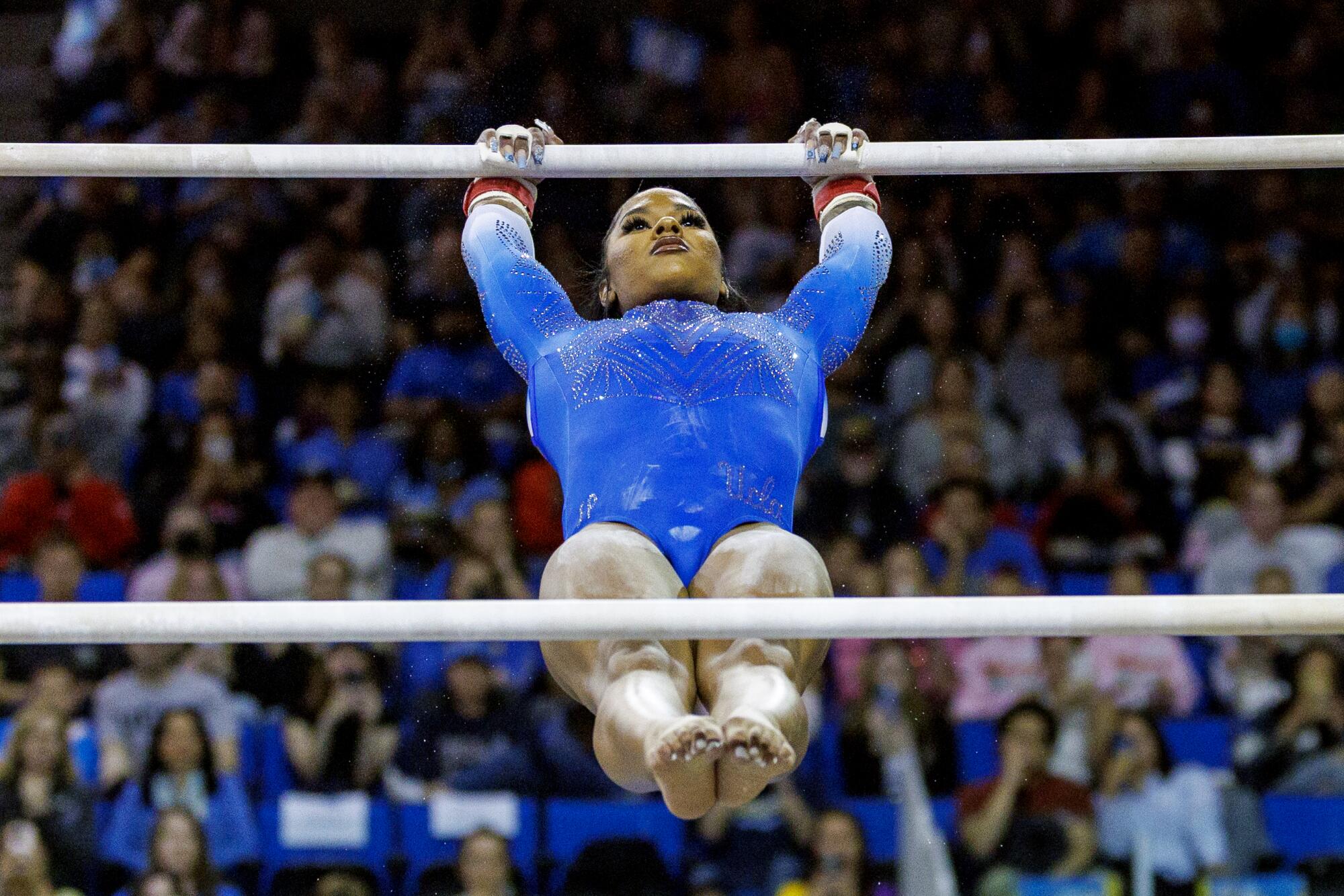 UCLA's Jordan Chiles performs on the uneven bars during Sunday's meet against Stanford at Pauley Pavilion.