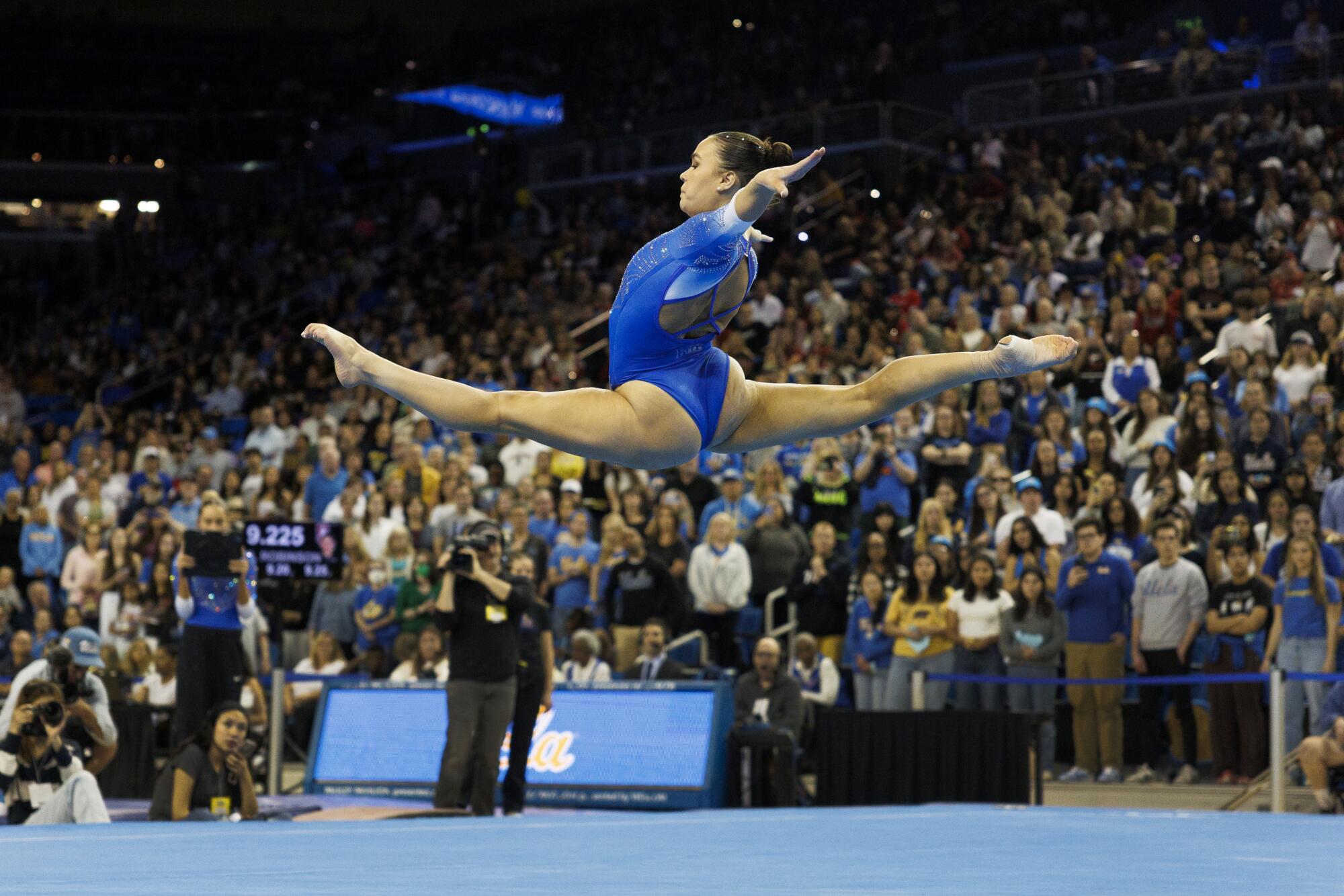 UCLA's Brooklyn Moors competes in floor exercise Saturday against Stanford.