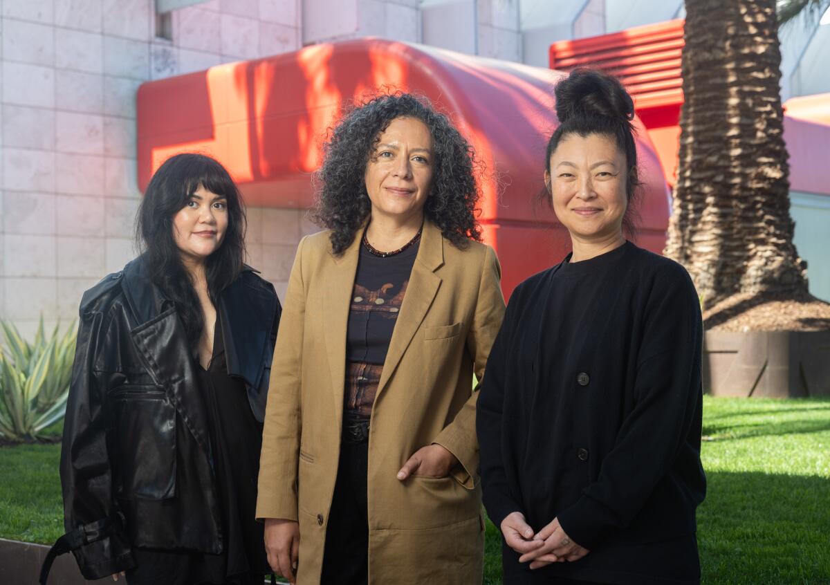 Artists Sarah Rosalena, left, Mariana Castillo Deball and Shio Kusaka outside LACMA. 