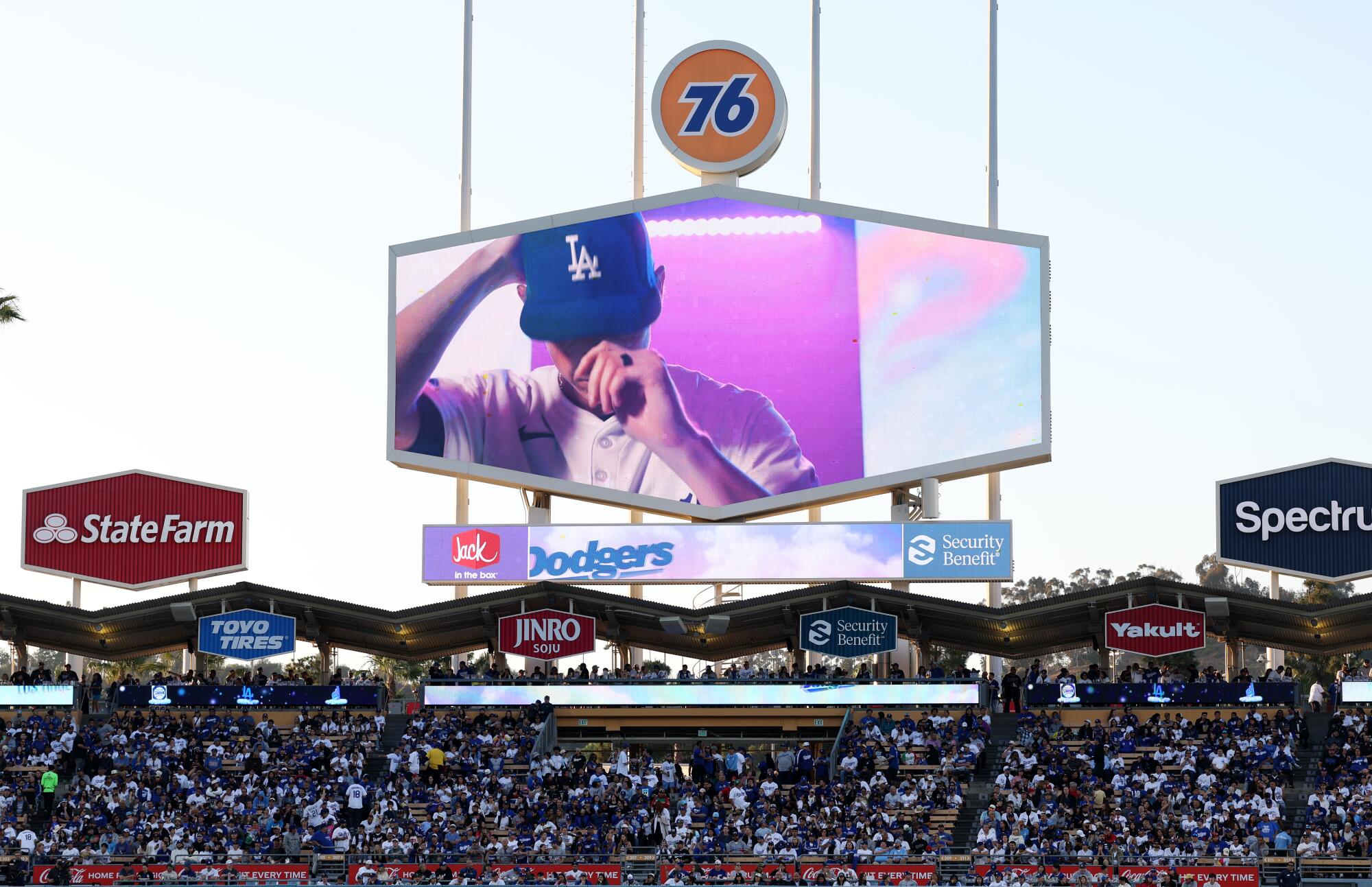 The 76 logo sits above the left field scoreboard at Dodger Stadium.