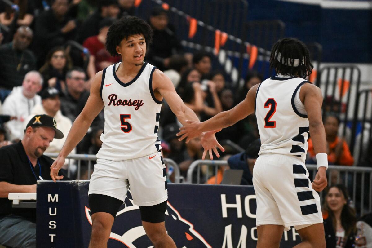 Brayden Burries (left) and Myles Walker led Roosevelt to a 65-64 win over Sierra Canyon.