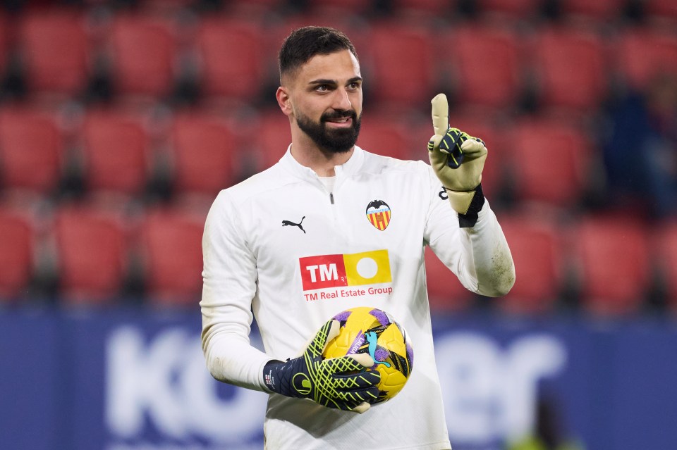 Giorgi Mamardashvili of Valencia CF warming up before a match.