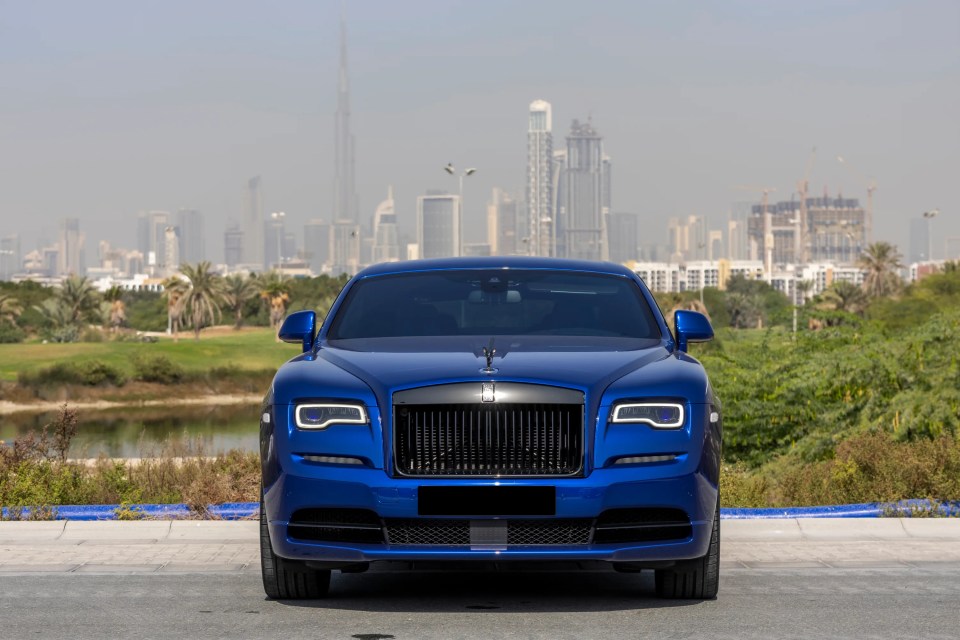 Front view of a blue Rolls-Royce Wraith Black Badge.