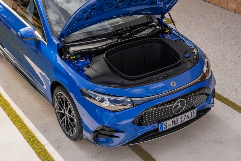 Blue Mercedes-Benz CLA with its hood open, showcasing the front and engine compartment.