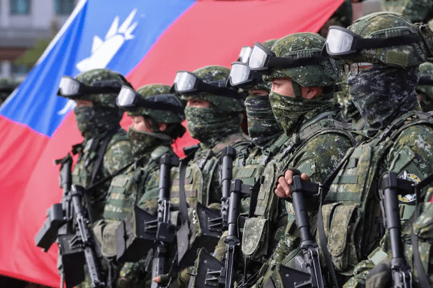 Taiwanese soldiers standing in formation with rifles.