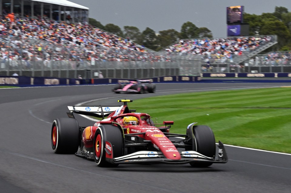 Lewis Hamilton driving a Ferrari during a Formula One race.