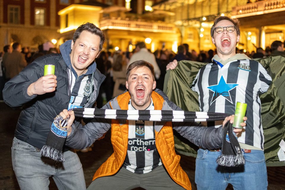 Newcastle United fans celebrating in Covent Garden after winning the Carabao Cup.