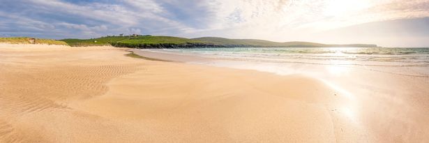 UK, Scotland, Yell, Panoramic view of Sands of Breckon beach at sunset