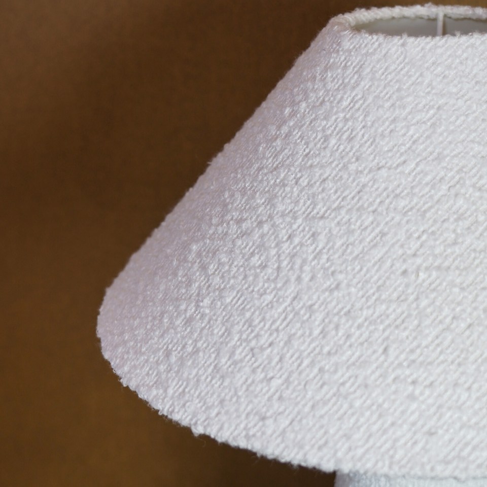 Cream boucle effect table lampshade.