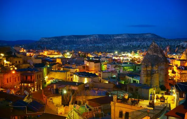 Night time, mountain and ancient buildings