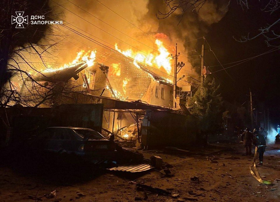 Firefighters battling a fire in Zaporizhzhia, Ukraine, following a Russian attack.