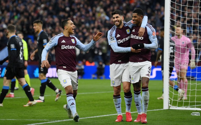 Soccer Football - Champions League - Round of 16 - Second Leg - Aston Villa v Club Brugge - Villa Park, Birmingham, Britain - March 12, 2025 Aston Villa's Marco Asensio celebrates scoring their third goal with Aston Villa's Marcus Rashford and Aston Villa's Youri Tielemans REUTERS/Jaimi Joy TPX IMAGES OF THE DAY