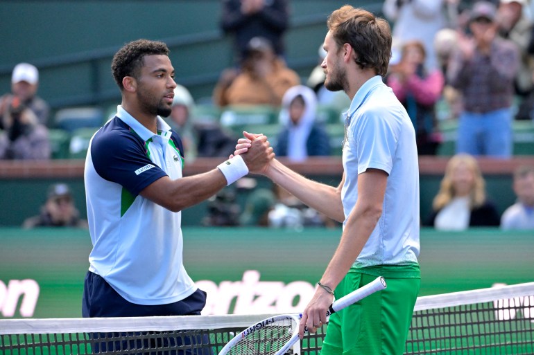 Mar 13, 2025; Indian Wells, CA, USA; Arthur Fils (FRA) shakes hans with Daniil Medvedev (RUS) after their semi-final match of the BNP Paribas Open at the Indian Well Tennis Garden. Mandatory Credit: Jayne Kamin-Oncea-Imagn Images