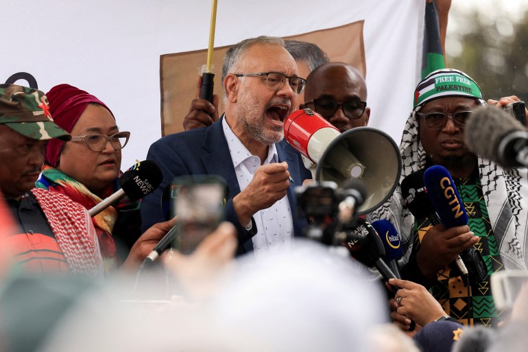 South Africa's expelled ambassador to the United States Ebrahim Rasool speaks upon his arrival at Cape Town International Airport, in Cape Town, South Africa, March 23, 2025. REUTERS/Esa Alexander TPX IMAGES OF THE DAY