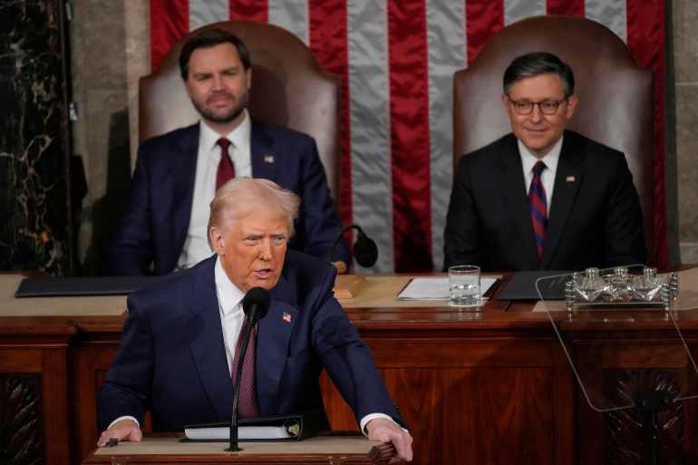 President Donald Trump talks about Greenland as he addresses a joint session of Congress in the House chamber at the U.S. Capitol in Washington