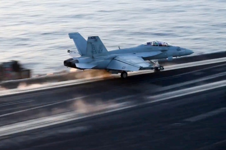 This image taken from video provided by the U.S. Navy shows an aircraft launching from the USS Harry S. Truman in the Red Sea before airstrikes in Sanaa, Yemen, Saturday, March 15, 2025. (U.S. Navy via AP)