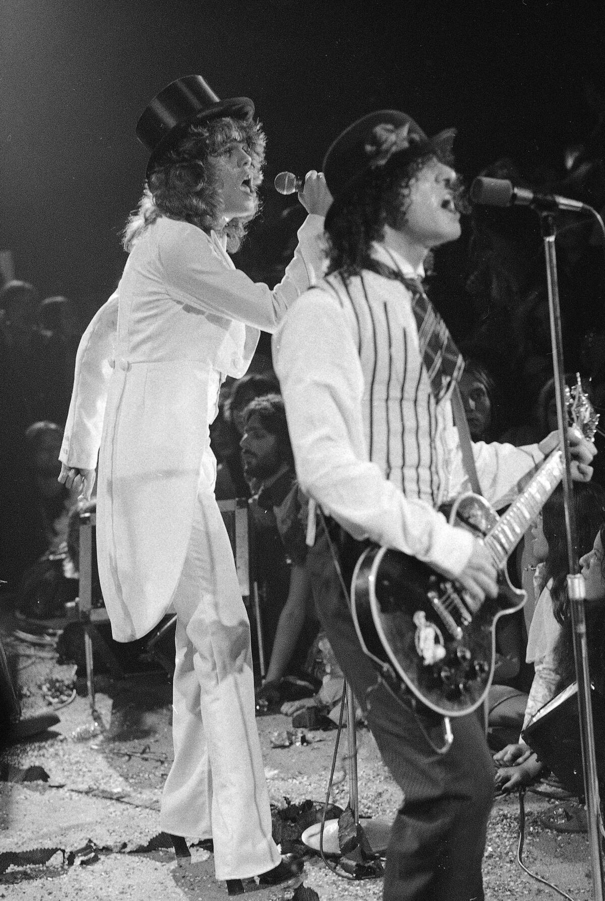 Rock group "The New York Dolls. "At left is lead singer David Johansen, with guitarist Sylvain Sylvain. 