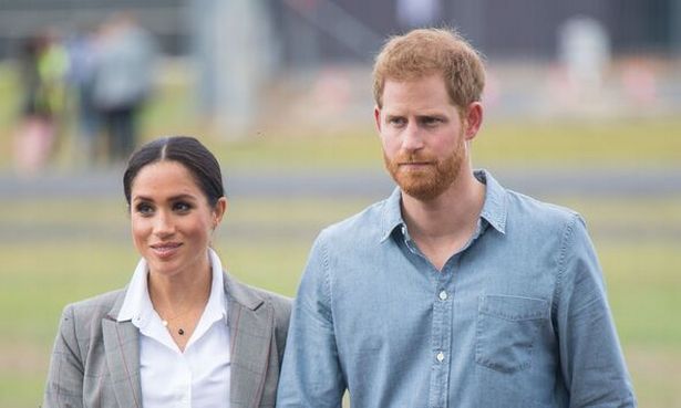 DUBBO, AUSTRALIA - OCTOBER 17: Meghan, Duchess of Sussex and Prince Harry, Duke of Sussex attend a naming and unveiling ceremony for the new Royal Fly