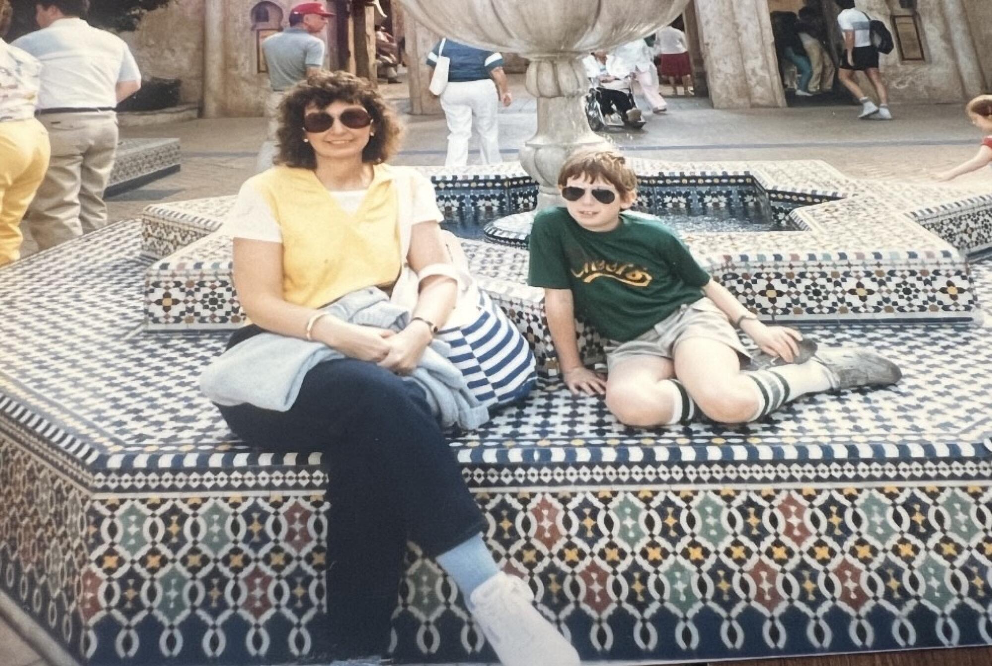 The author at a young age with his mother, Donna, at Walt Disney World's Epcot in the 1980s.