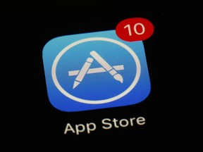 FILE - Apple's App Store icon is displayed on an iPad in Baltimore, March 19, 2018.