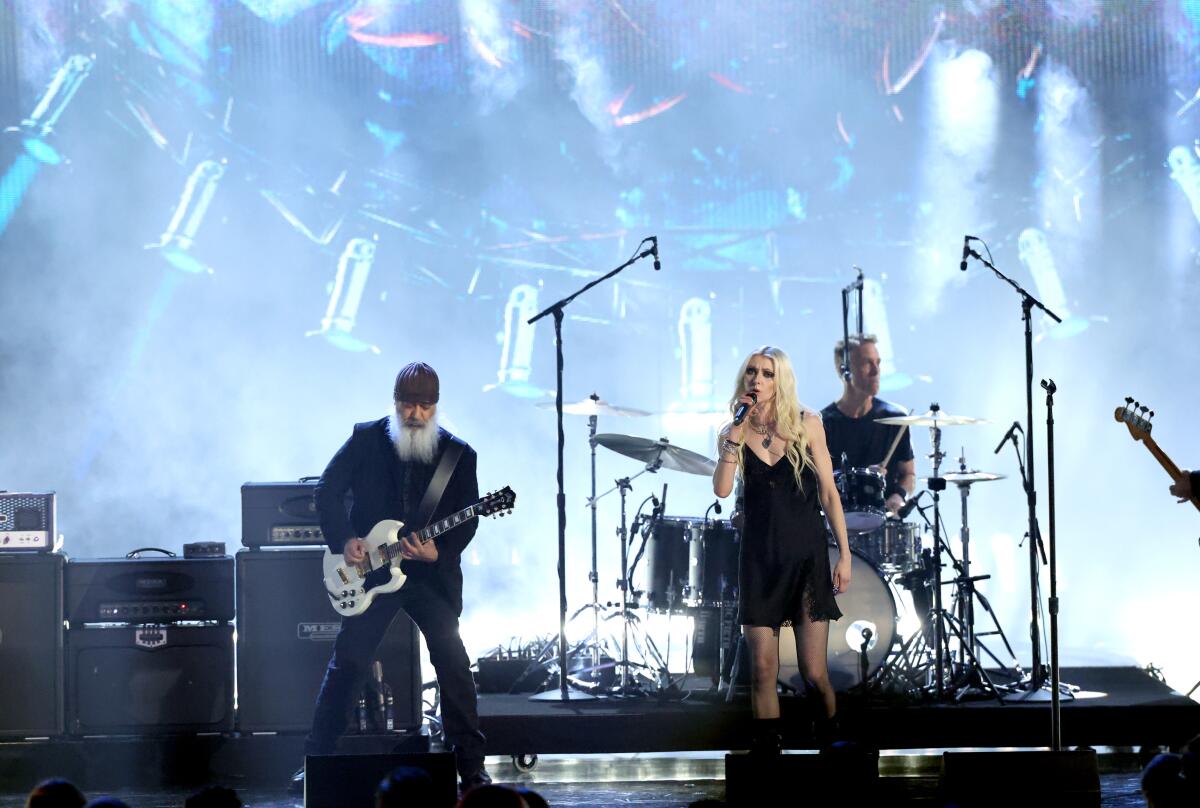 Soundgarden and Taylor Momsen perform on stage at Rock Hall induction 