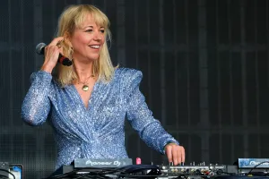 Sara Cox, British DJ, performing at a music festival.
