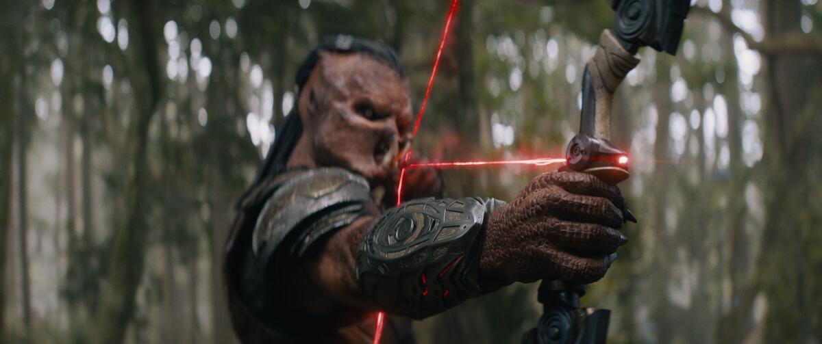 an alien drawing drawing a hi-tech laser bow and arrow