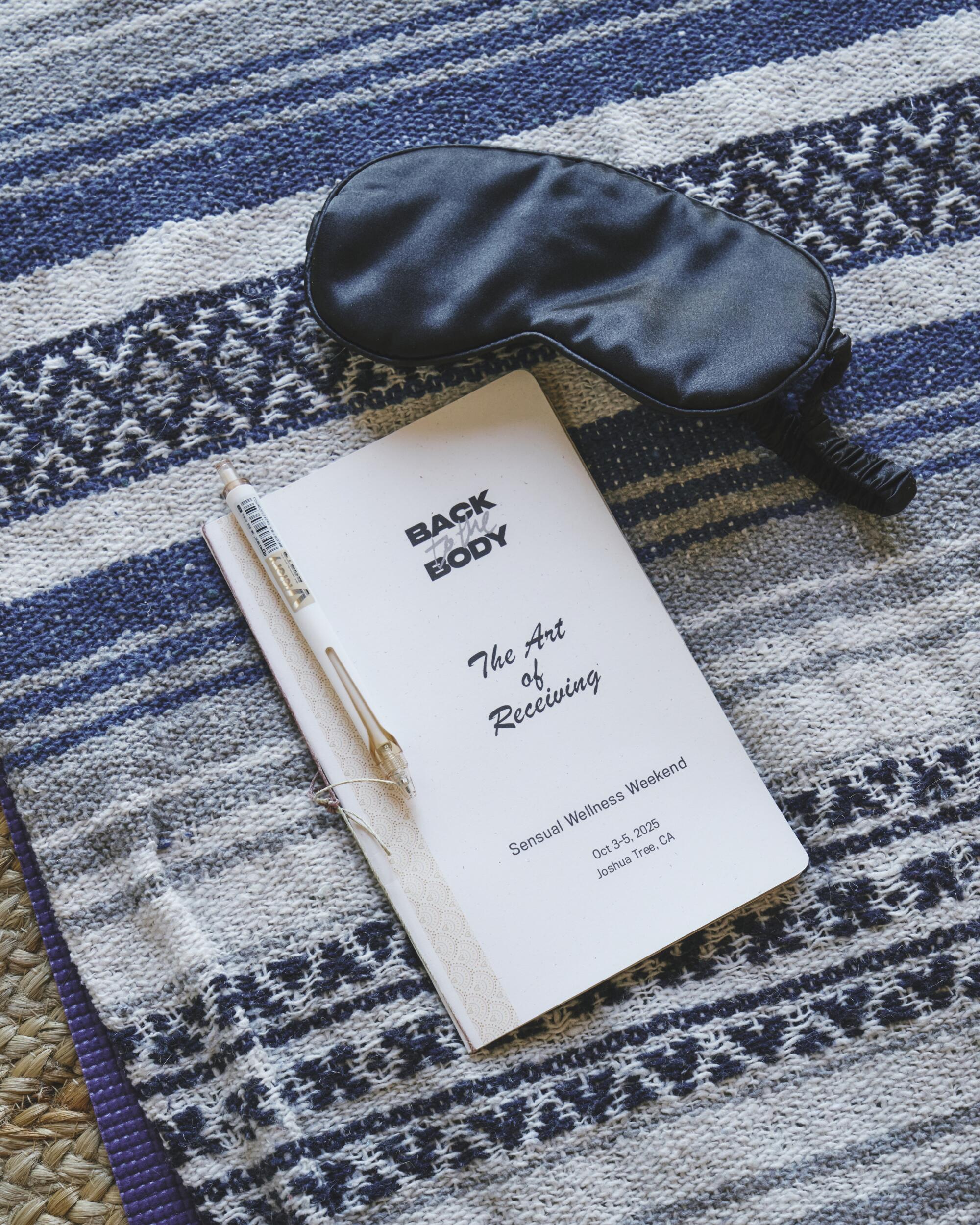 A blindfold and journal. 