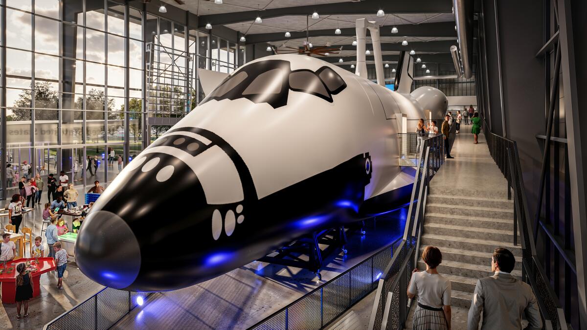 This is a rendering of the space shuttle mock-up, dubbed "Inspiration, in the center of the museum expansion.