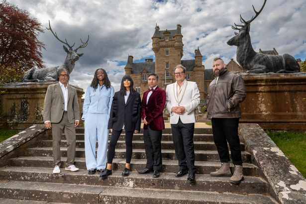 Alan Carr outside the Traitors castle