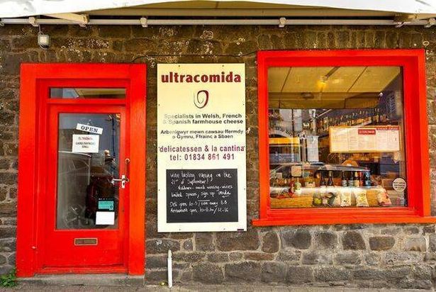 THe Ultracomida deli front in a vibrant red