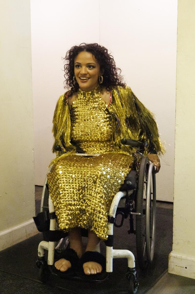 Bode makes her way onto the set.