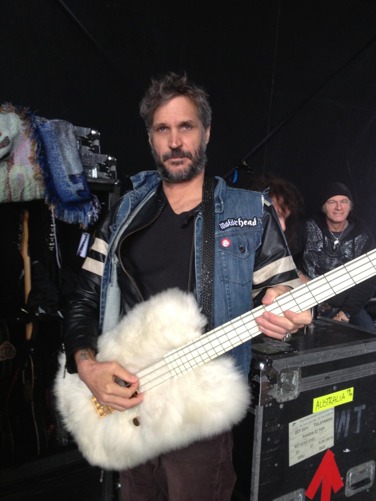 Bad Religion bassist Jay Bentley plays a fuzzy white bass