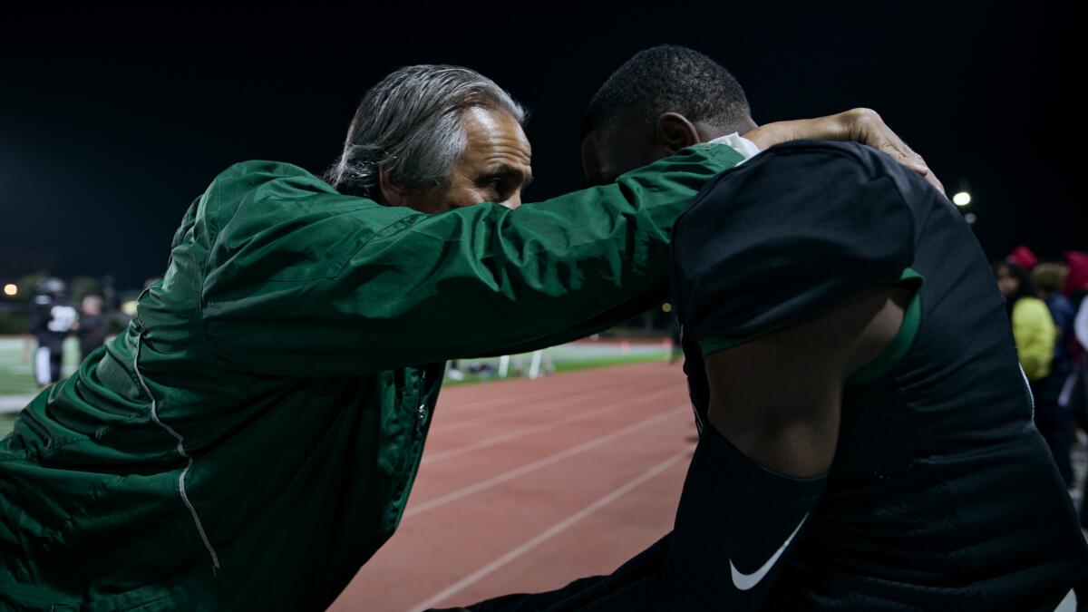 In a scene from "Last Chance U," Laney coach John Beam talks to player Rejzohn Wright.