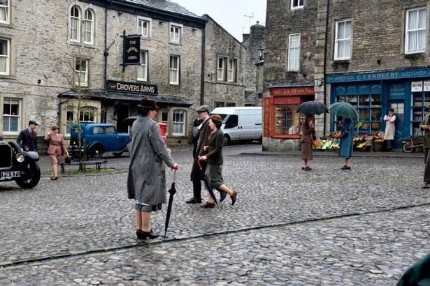 Filming being undertaken of All Creatures Great and Small in the village square in Grassington 