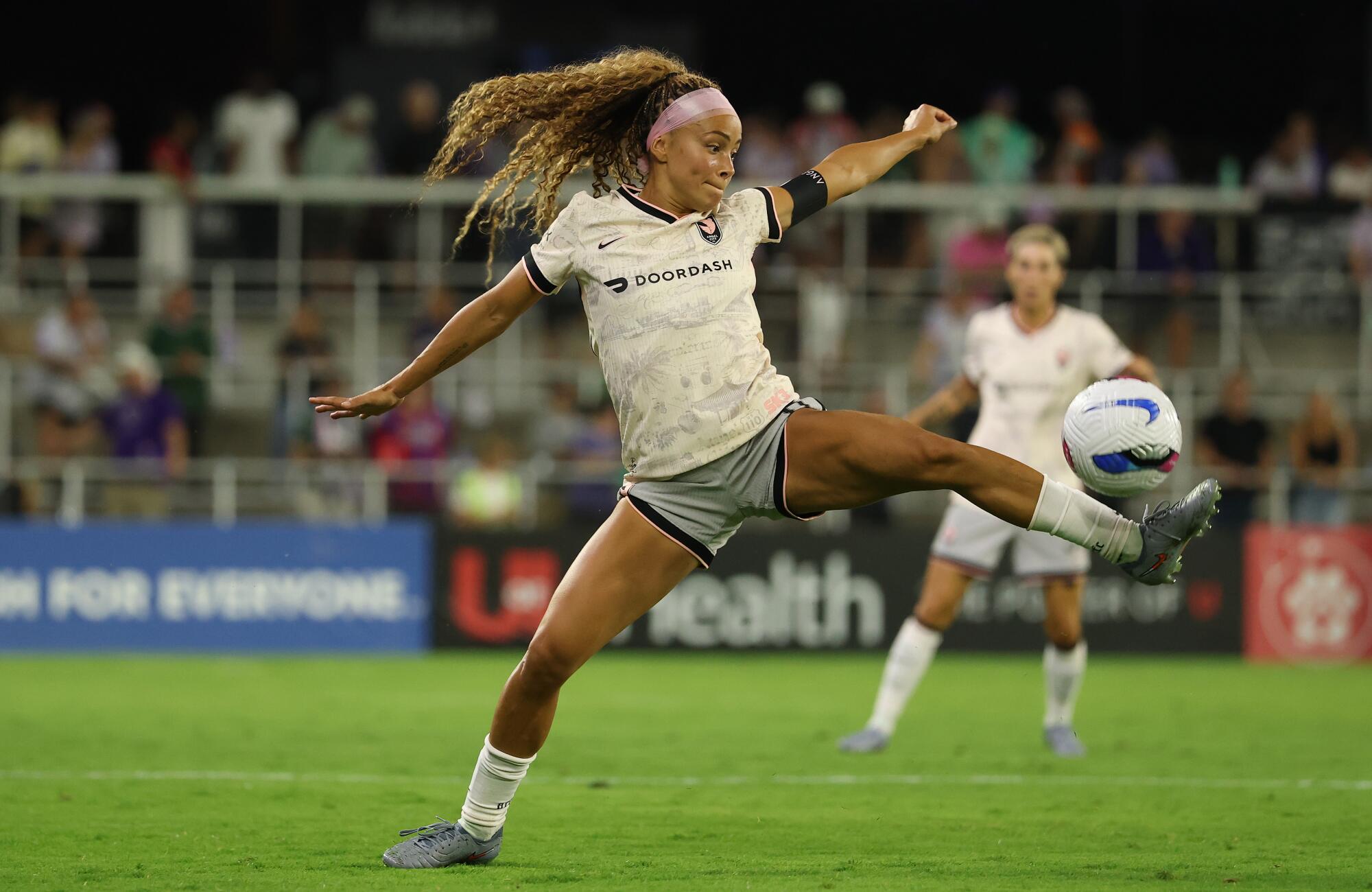 Angel City's Sarah Gorden controls the ball against Racing Louisville on Sept. 27.