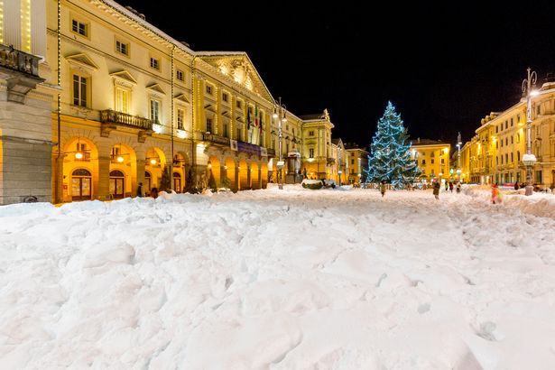 .Chanoux Square and Town Hall in center of Aosta, at Christmas time.