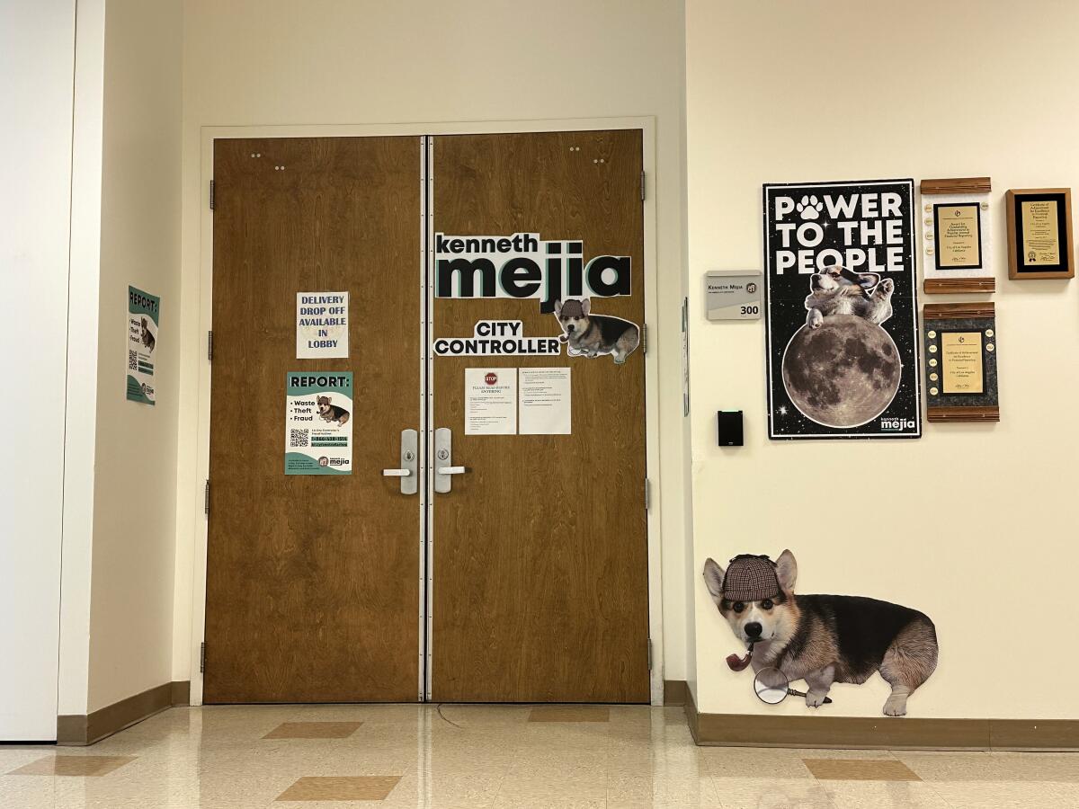 Images of corgis on the doors to Los Angeles City Controller Kenneth Mejia's office at City Hall East