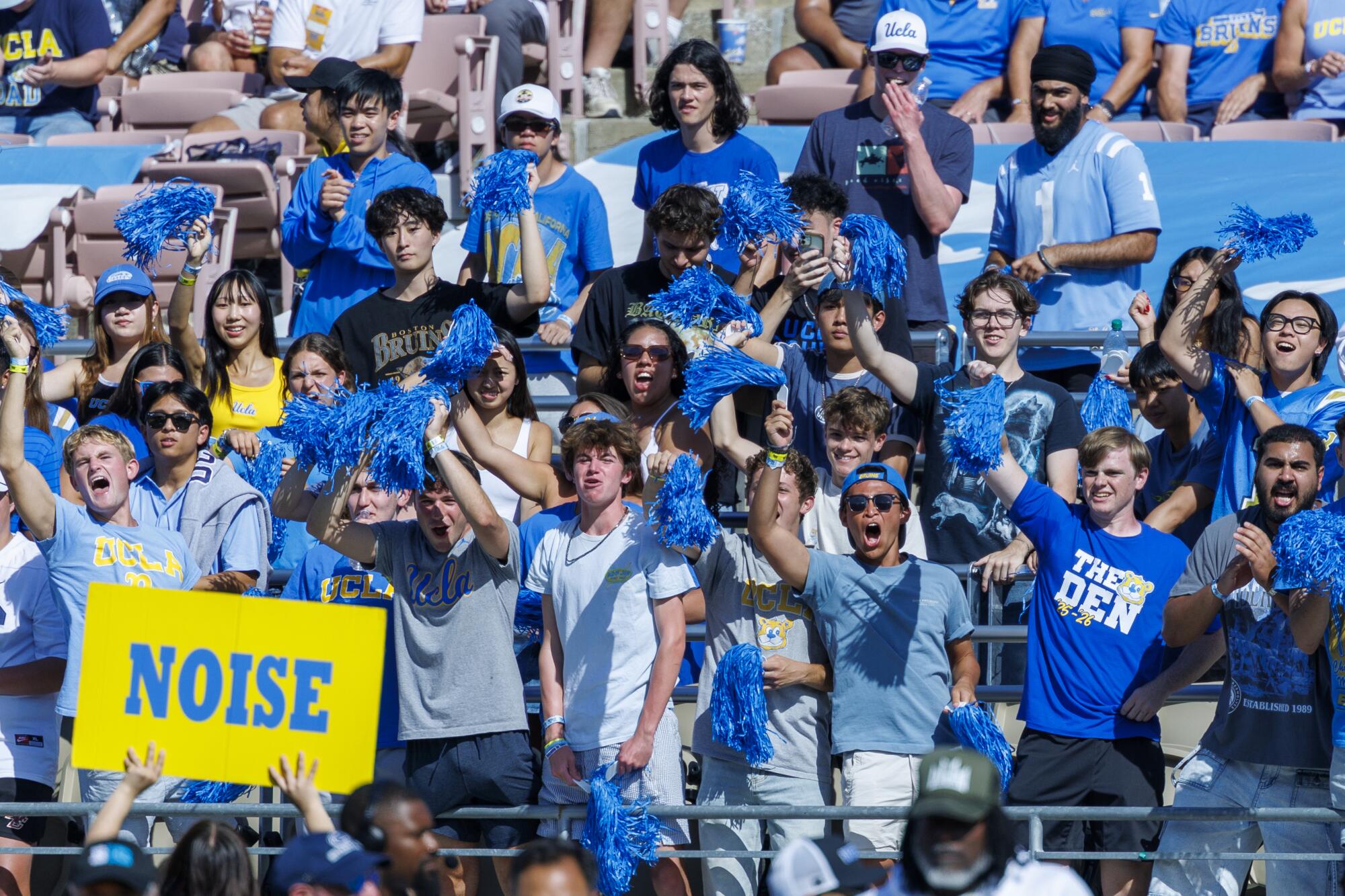UCLA fans cheer during the game against Penn State at the Rose Bowl on Oct. 4.