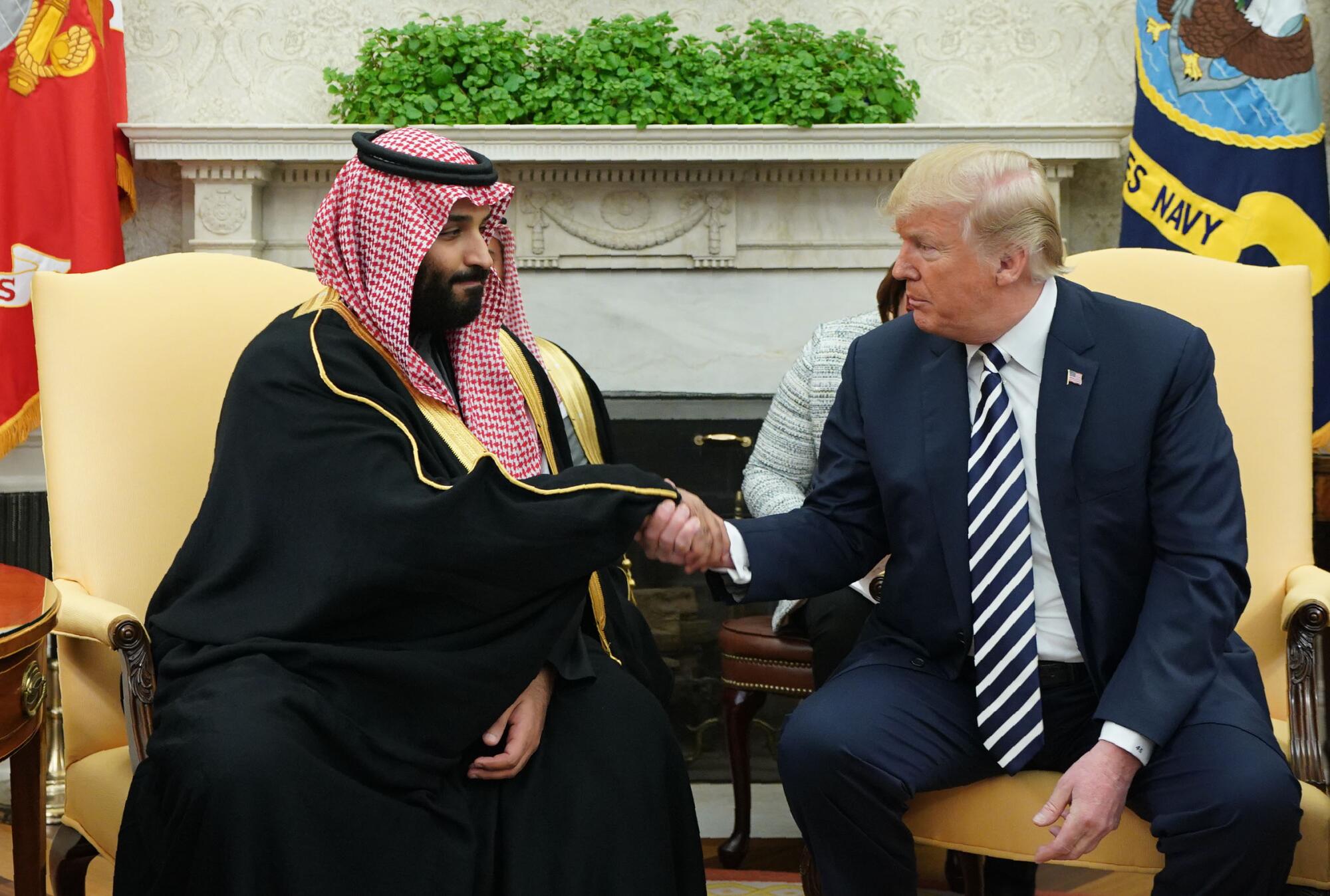 President Trump shakes hands with Saudi Arabia's Crown Prince Mohammed bin Salman at the White House in 2018.
