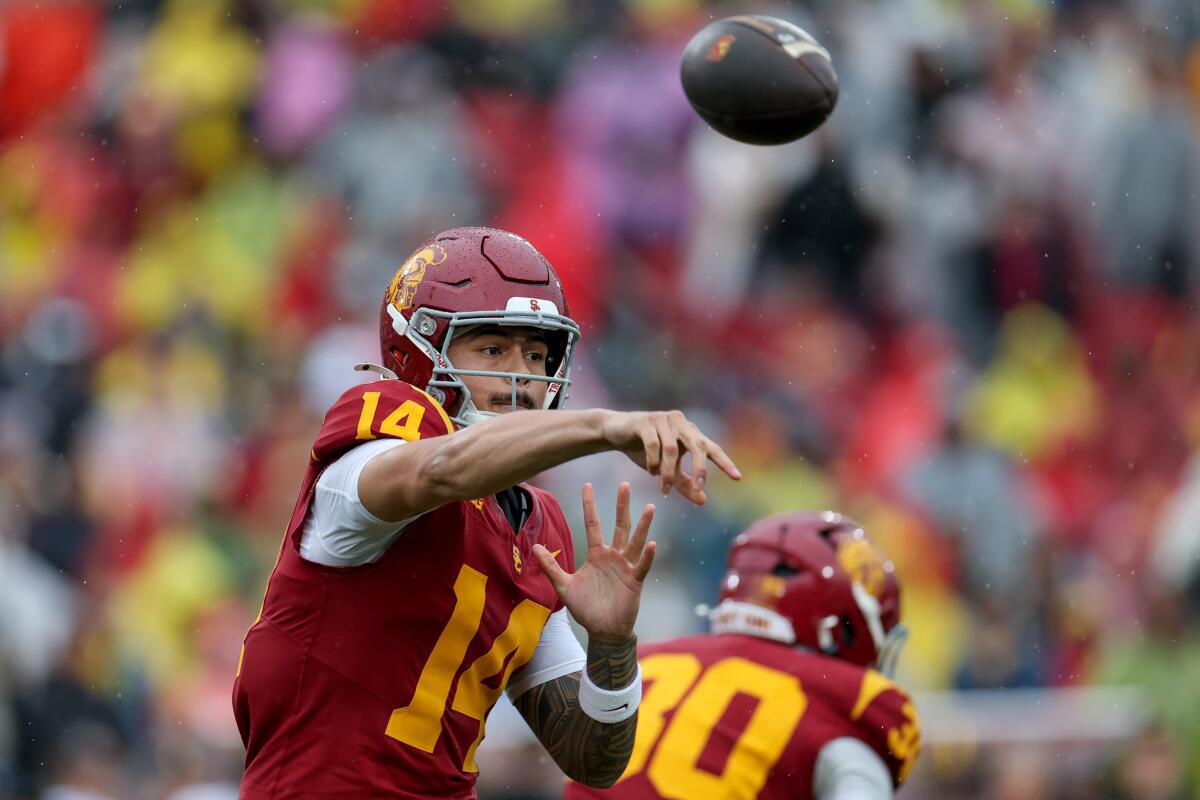 USC quarterback Jayden Maiava throws a pass during a win over Iowa on Nov. 15 at the Coliseum.