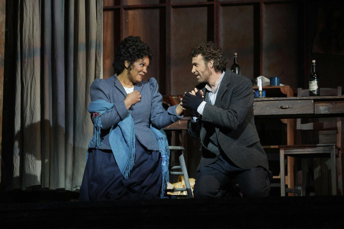Janai Brugger as Mimi and Oreste Cosimo as Rodolfo in L.A. Opera's 2025 production of "La Bohème."