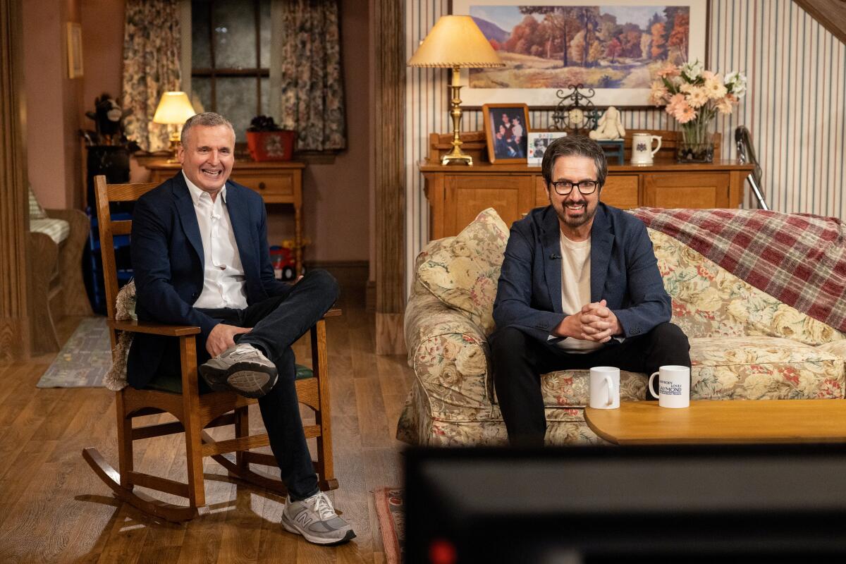 Phil Rosenthal, left, and Ray Romano on the recreated set of "Everybody Loves Raymond."