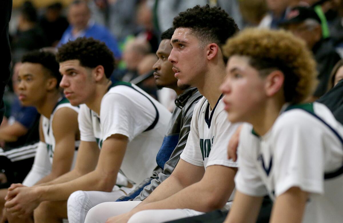 LiAngelo Ball, center, is flanked by his brothers Lonzo, second from left, and LaMelo in 2016.