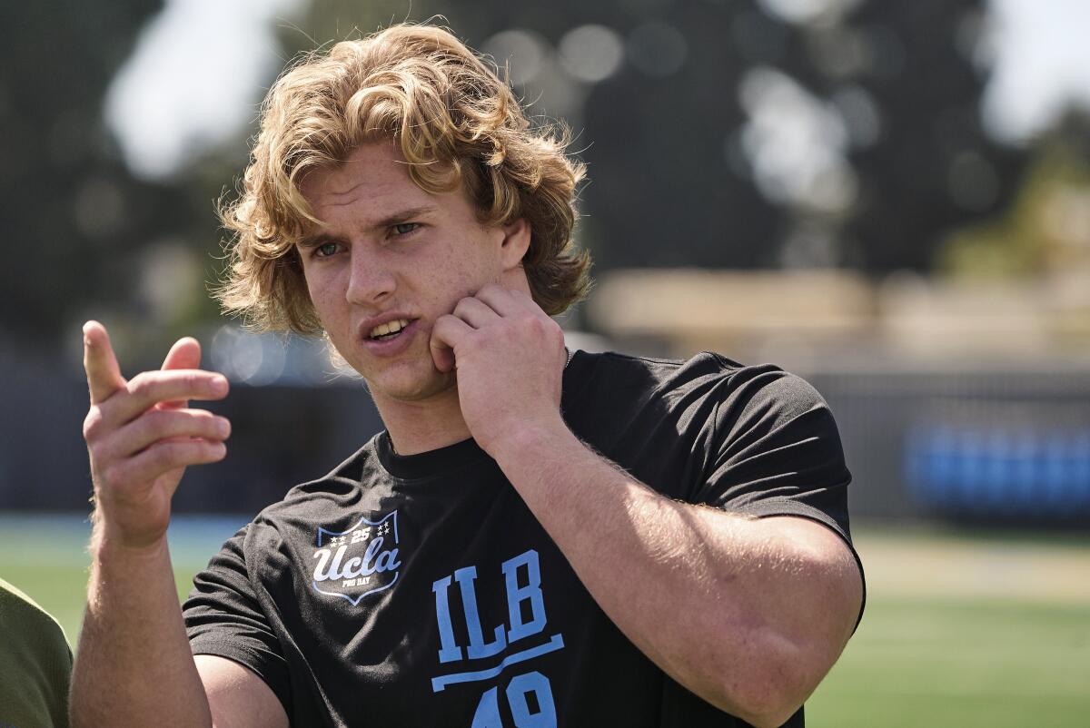 FILE - UCLA linebacker Carson Schwesinger attends the team's NCAA college football pro day.