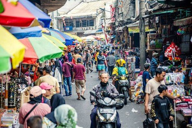 Bustling Street Market Scene in Jakarta, Indonesia