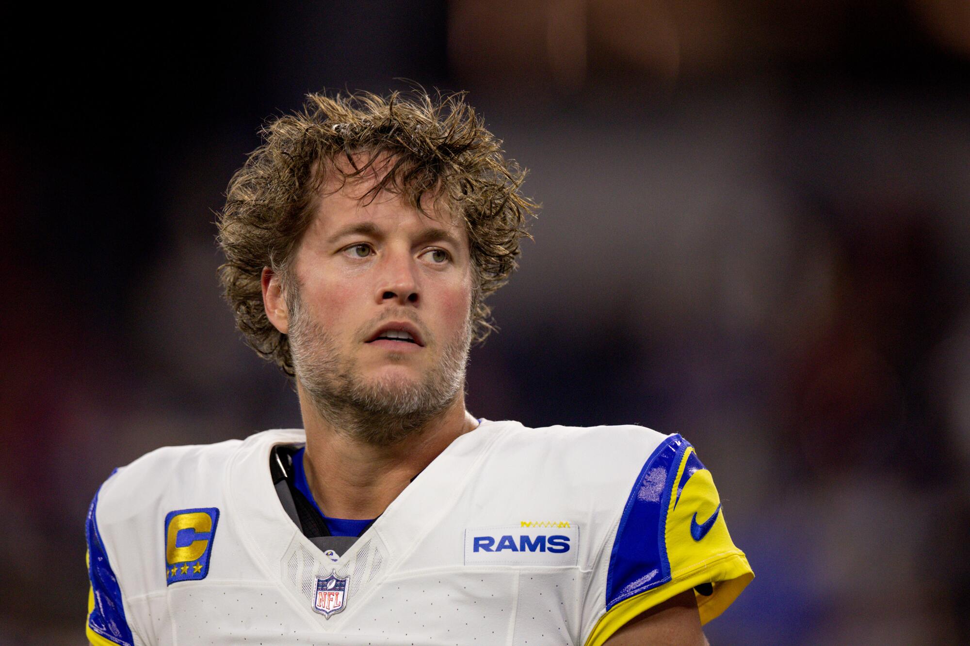 Rams quarterback Matthew Stafford warms up before a 34-7 win over the Buccaneers.