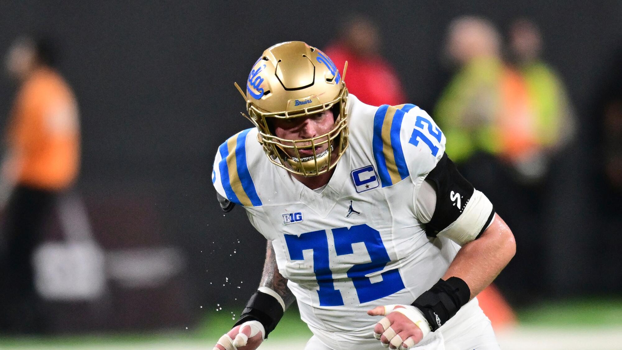 UCLA offensive lineman Garrett DiGiorgio leans forward during a game on Sept. 6 in Las Vegas.
